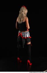 CHRISTY STANDING POSE WITH RED APPLE